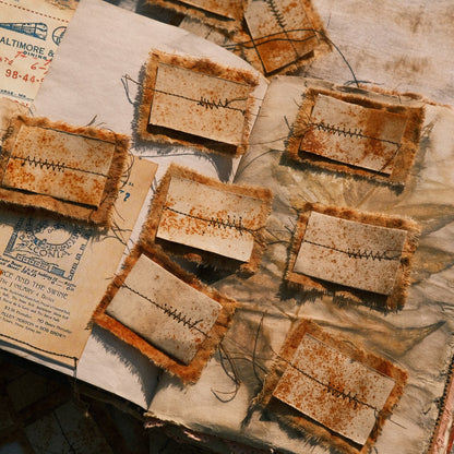 Vintage-Style Junk Journal Embellishments: Rust-Distressed Sewn Fabric Tags & Wasteland-Themed Collage Paper