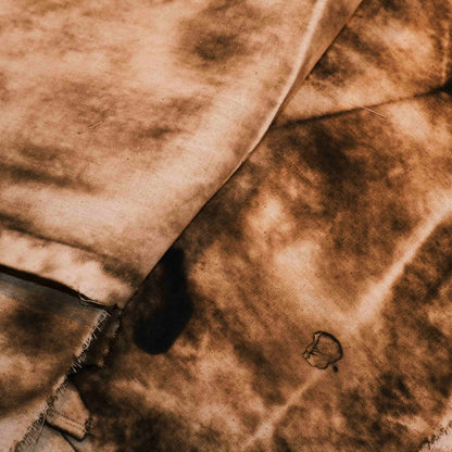 Vintage-style distressed and tattered fabric, suitable for art journaling, DIY collage, and wasteland-themed photo backdrops.