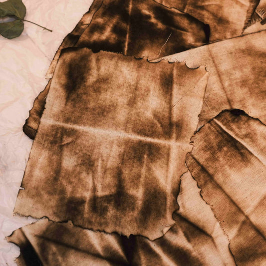 Vintage-style distressed and tattered fabric, suitable for art journaling, DIY collage, and wasteland-themed photo backdrops.