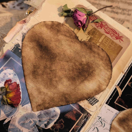 Vintage distressed, tattered, and burnt heart-shaped fabric - art journal DIY decoration